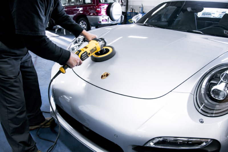 man working at an automotive service center in bucks county pa