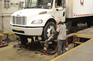 mechanic repairing a heavy duty truck in bristol pa